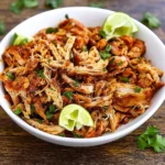 Easy Mexican Pulled Chicken served with tortillas
