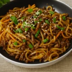 Mongolian Ground Beef Noodles recipe served in a bowl