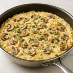 One-Pot Creamy Mushroom Orzo recipe served warm with parsley garnish