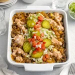 Big Mac Casserole with melted cheese and fresh toppings