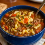 Easy Hamburger Noodle Soup in rustic bowl