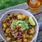 Loaded Potato Taco Bowl recipe with crispy potatoes and beef