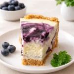 Blueberry Cheesecake with creamy filling and blueberry swirl