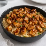 Honey BBQ Chicken Rice skillet with glossy sauce and rice