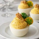 St. Patrick’s Day Deviled Eggs appetizer with basil clover garnish