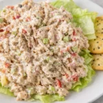 Subway Seafood Salad recipe in a bowl with lettuce and lemon