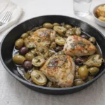 Mediterranean Lemon Chicken with Artichokes and Olives in skillet